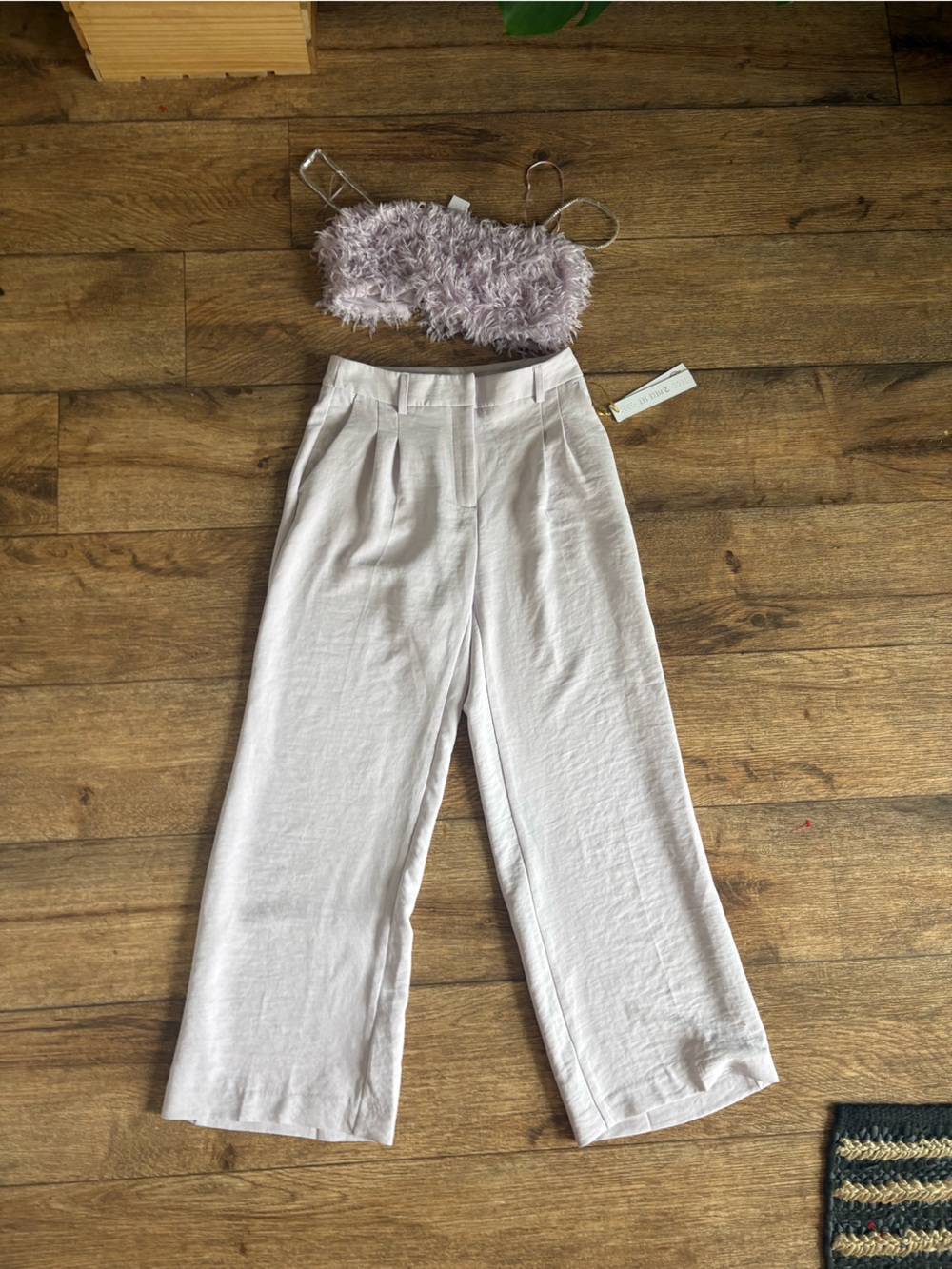 House of Harlow set with feather bandeau and high waisted wide leg trousers